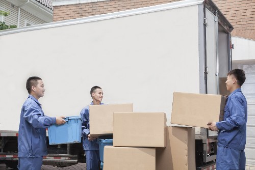 Staff reviewing safety procedures inside a storage unit facility