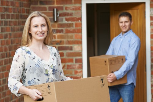 Household furniture and packed boxes prepared for storage in Stjohnswood