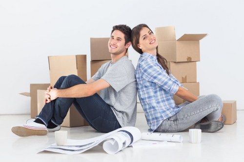 Careful unloading of belongings during a small removal job in Stjohnswood